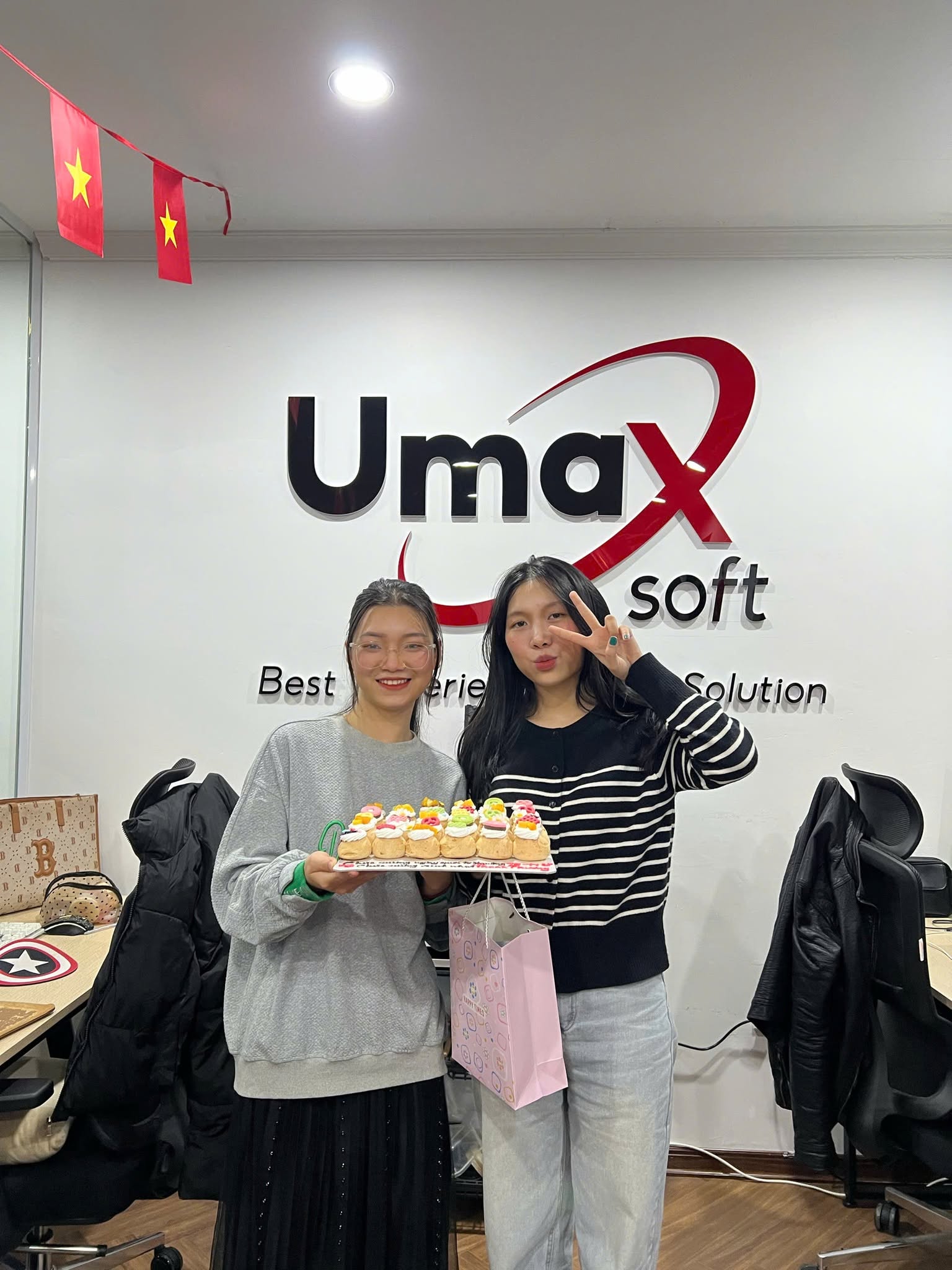 Celebrating together at the UMAXSOFT office