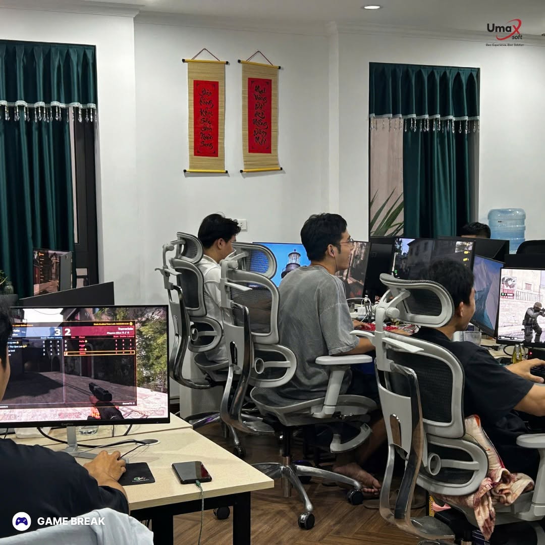 Umaxers taking a game break in the office