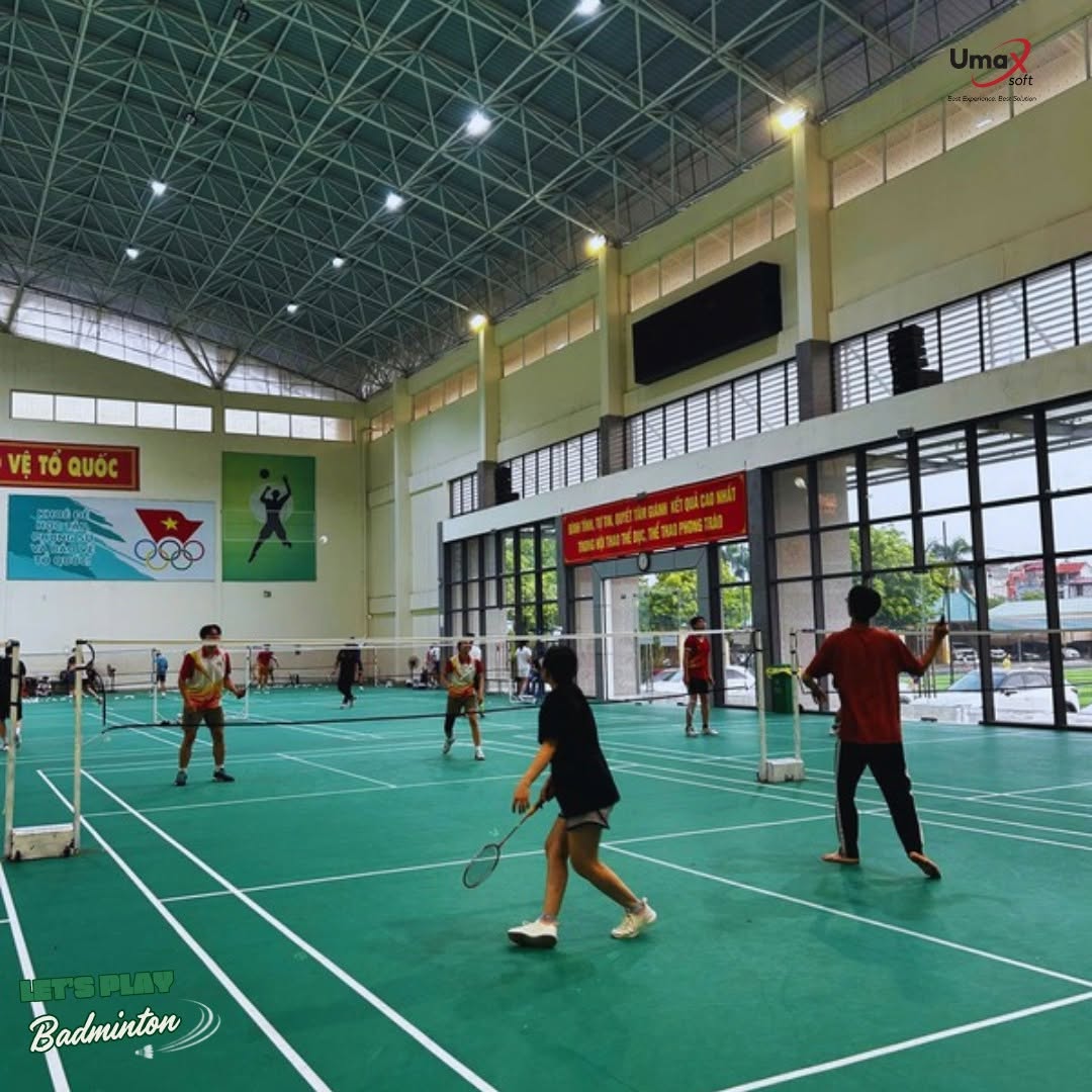 Umaxers playing badminton after hours